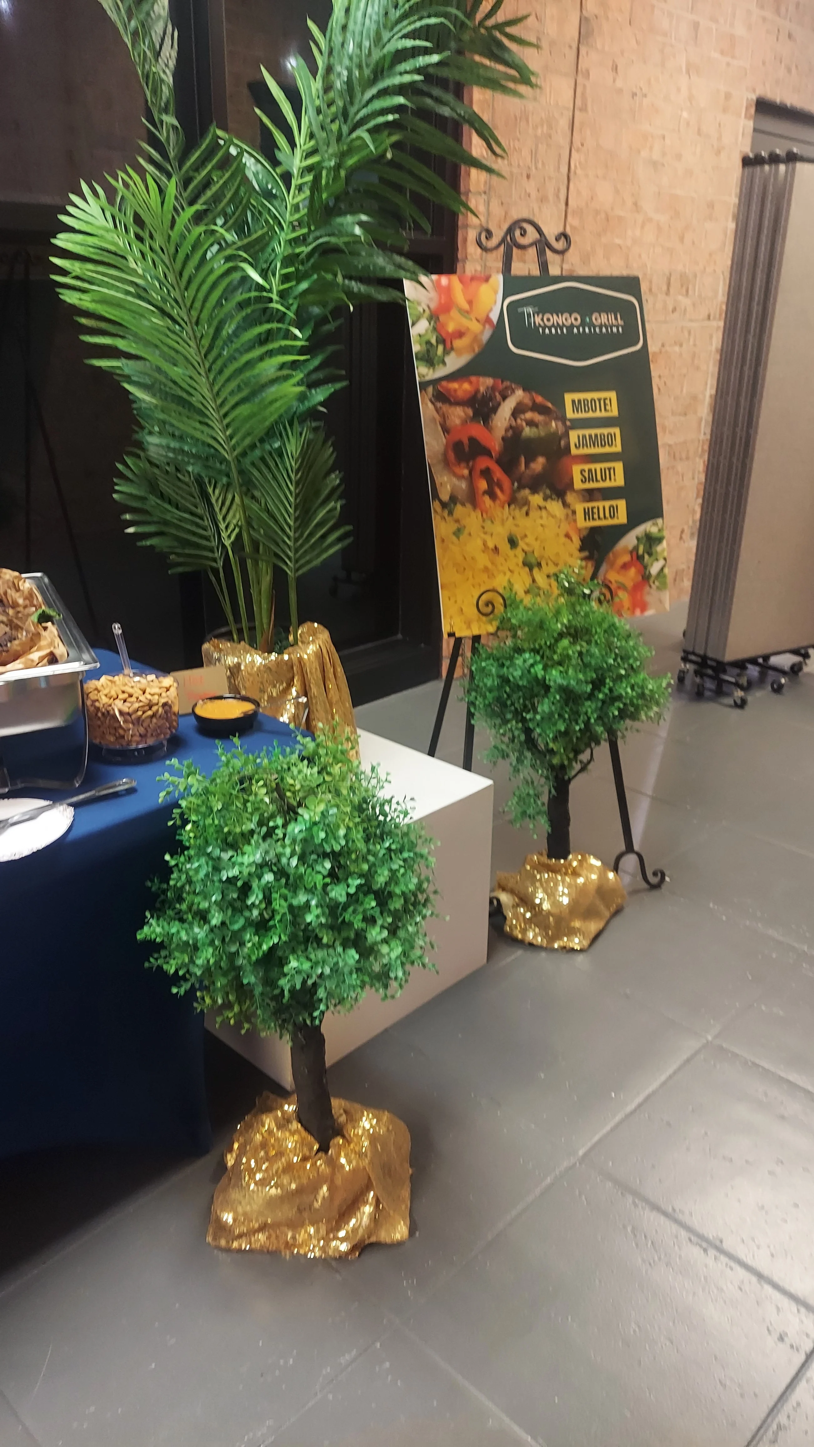 Restaurant display with tropical decor and vibrant menu sign