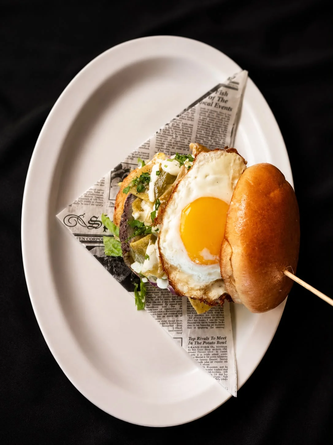 Delicious breakfast sandwich with fried egg