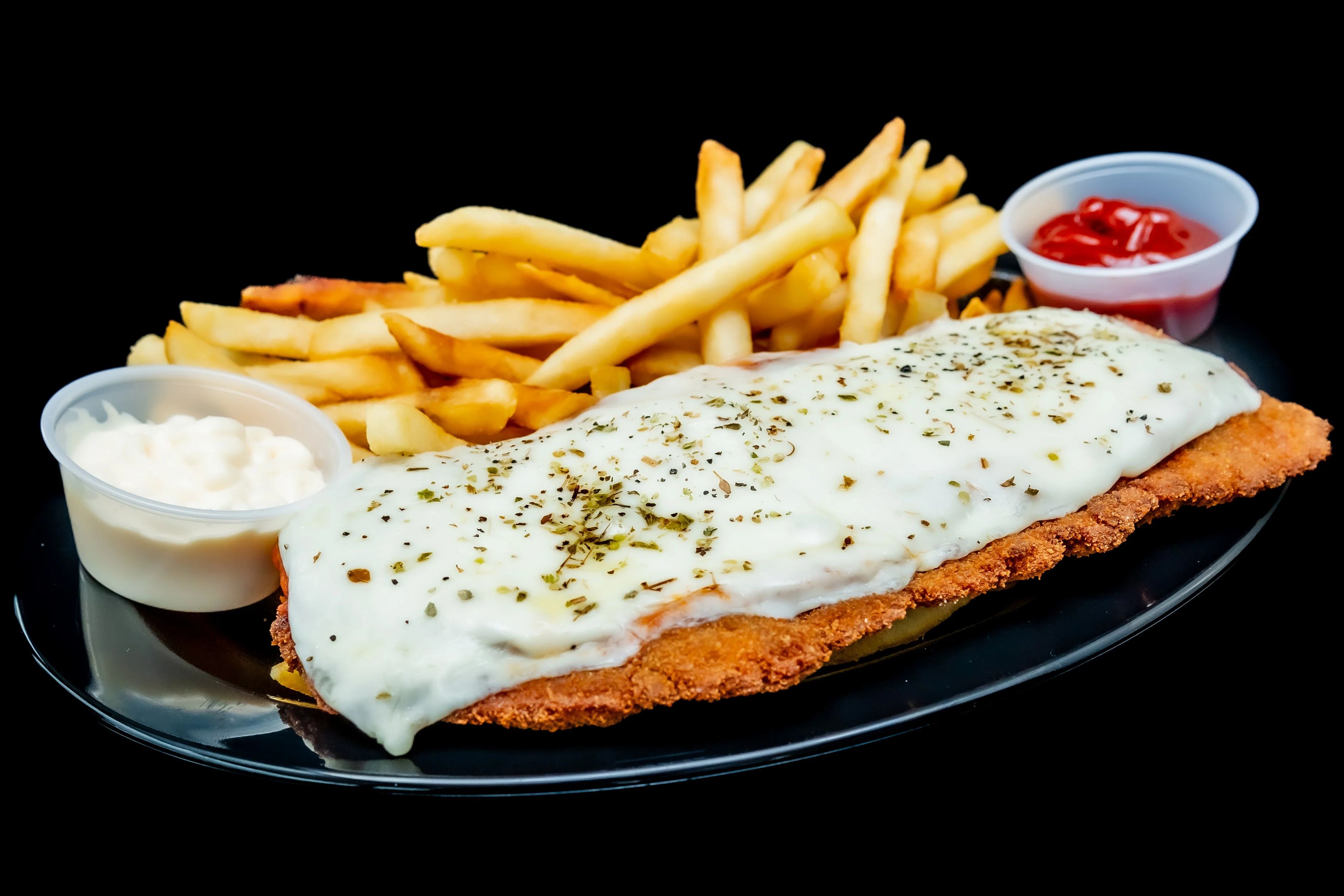Crispy fish fillet with melted cheese and fries