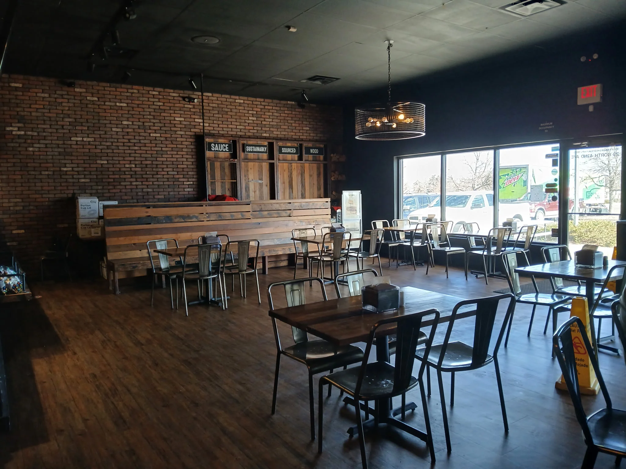 Cozy restaurant interior with exposed brick and modern seating