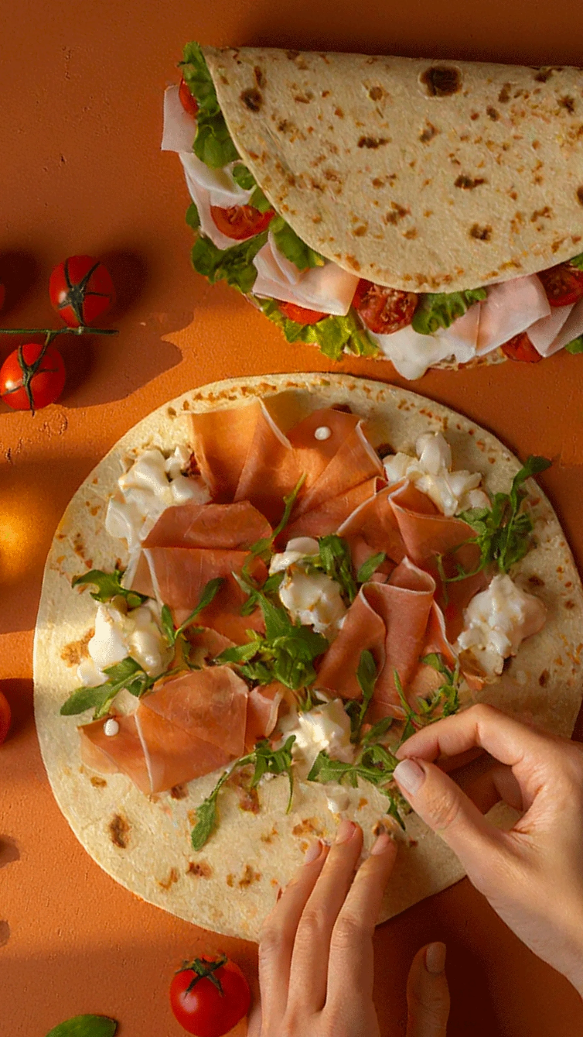Italian prosciutto wrap with fresh greens