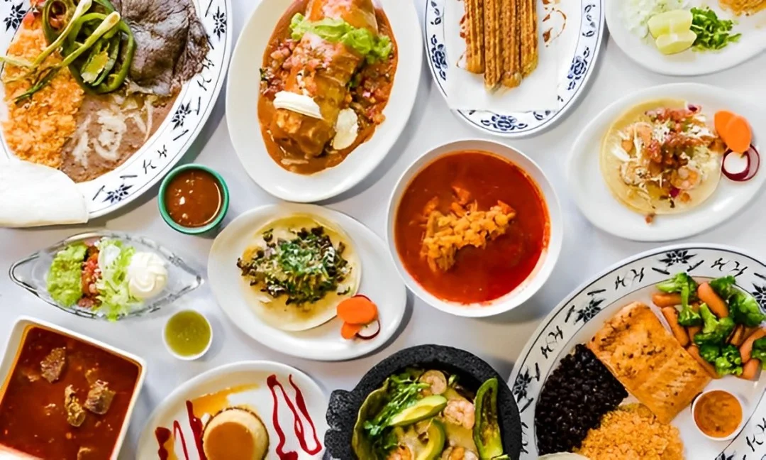 Colorful Mexican feast with tacos, enchiladas, and churros