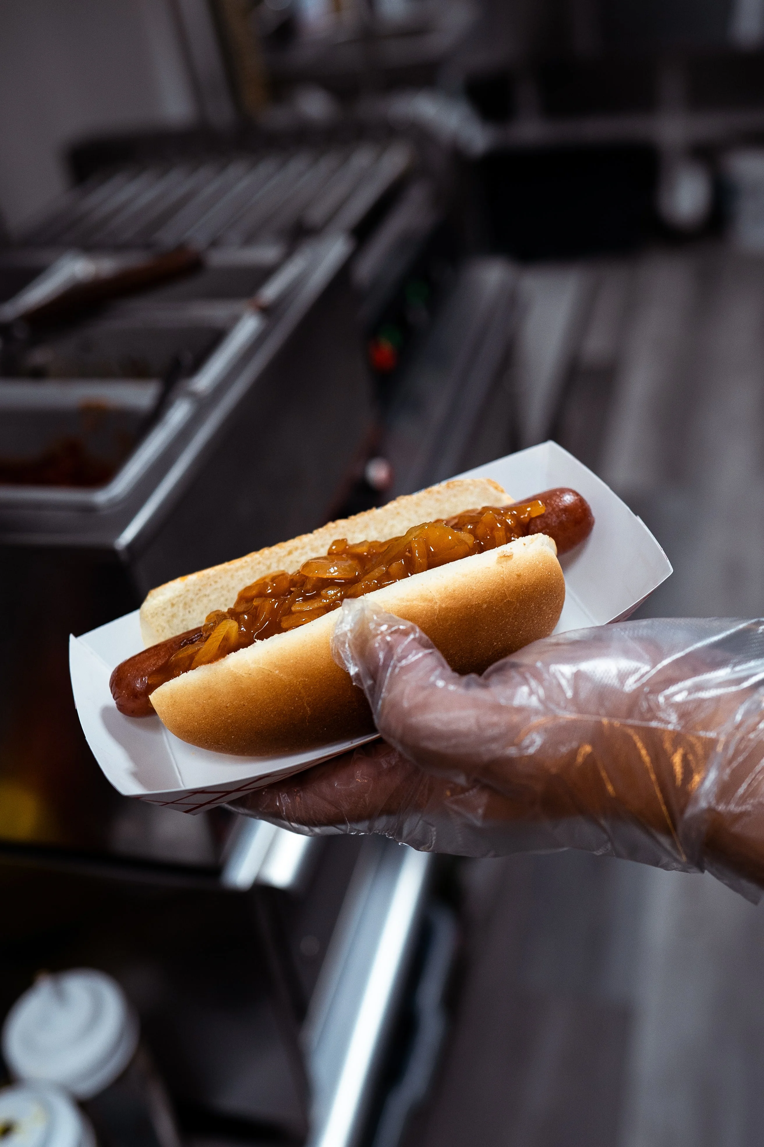 Classic American hot dog with onions in a bun