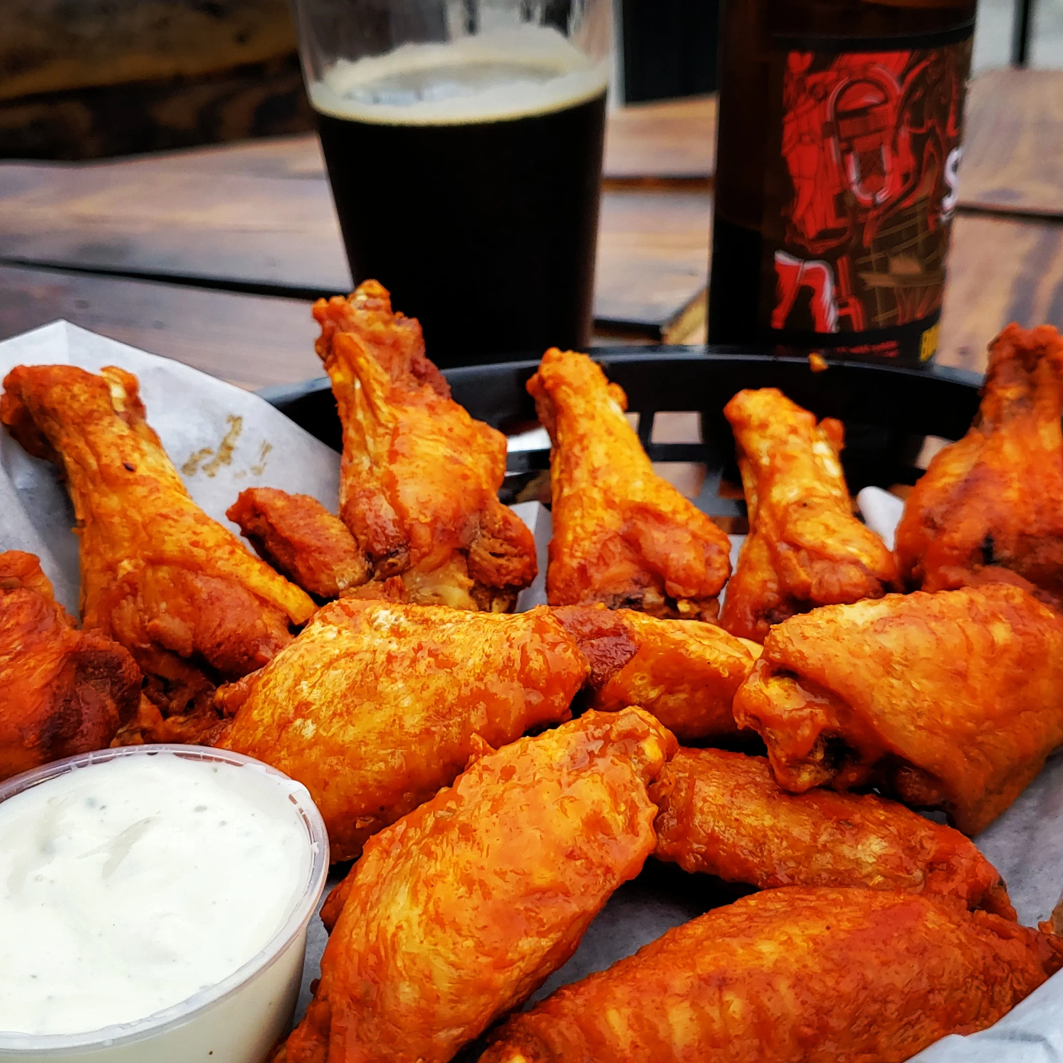 Crispy buffalo chicken wings with ranch dipping sauce
