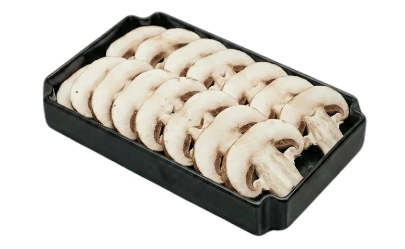 Fresh white mushrooms in a black plastic tray.