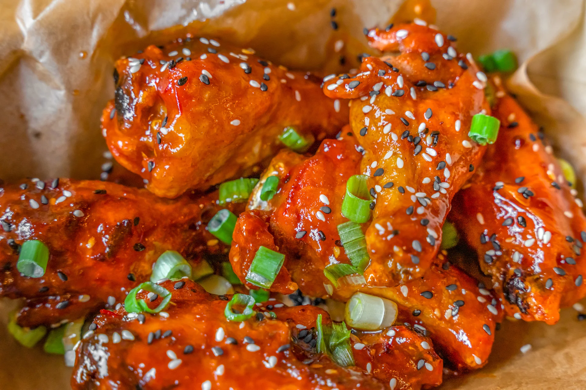 Korean spicy chicken wings with sesame and green onions