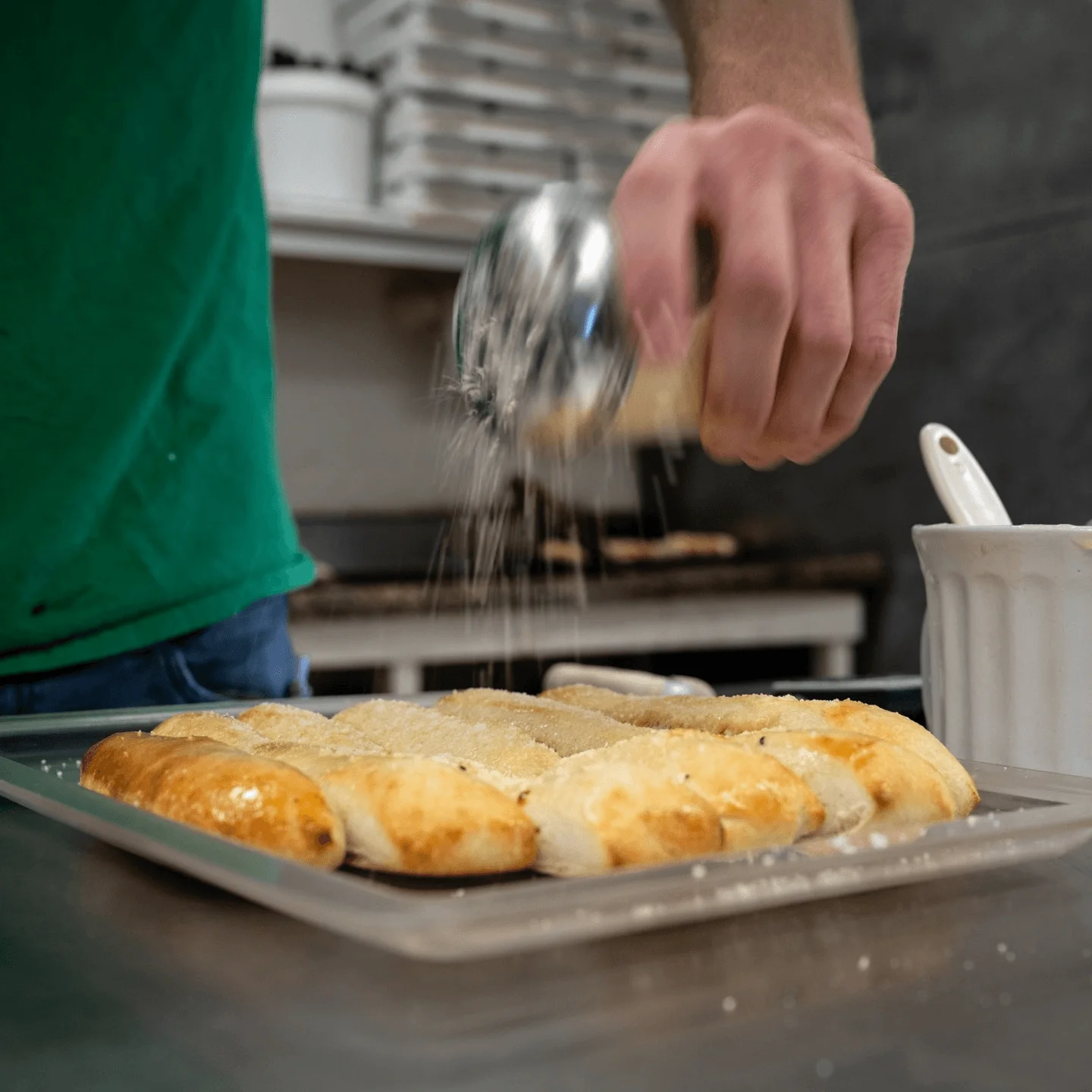 Garlic bread topped with extra garlic