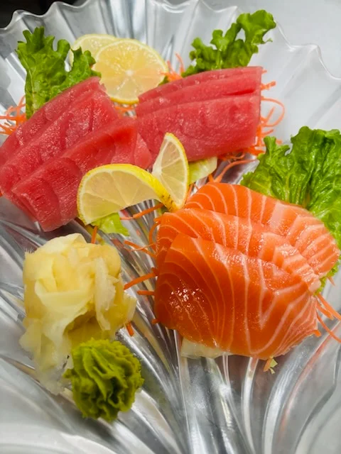 Sashimi platter featuring fresh salmon and tuna