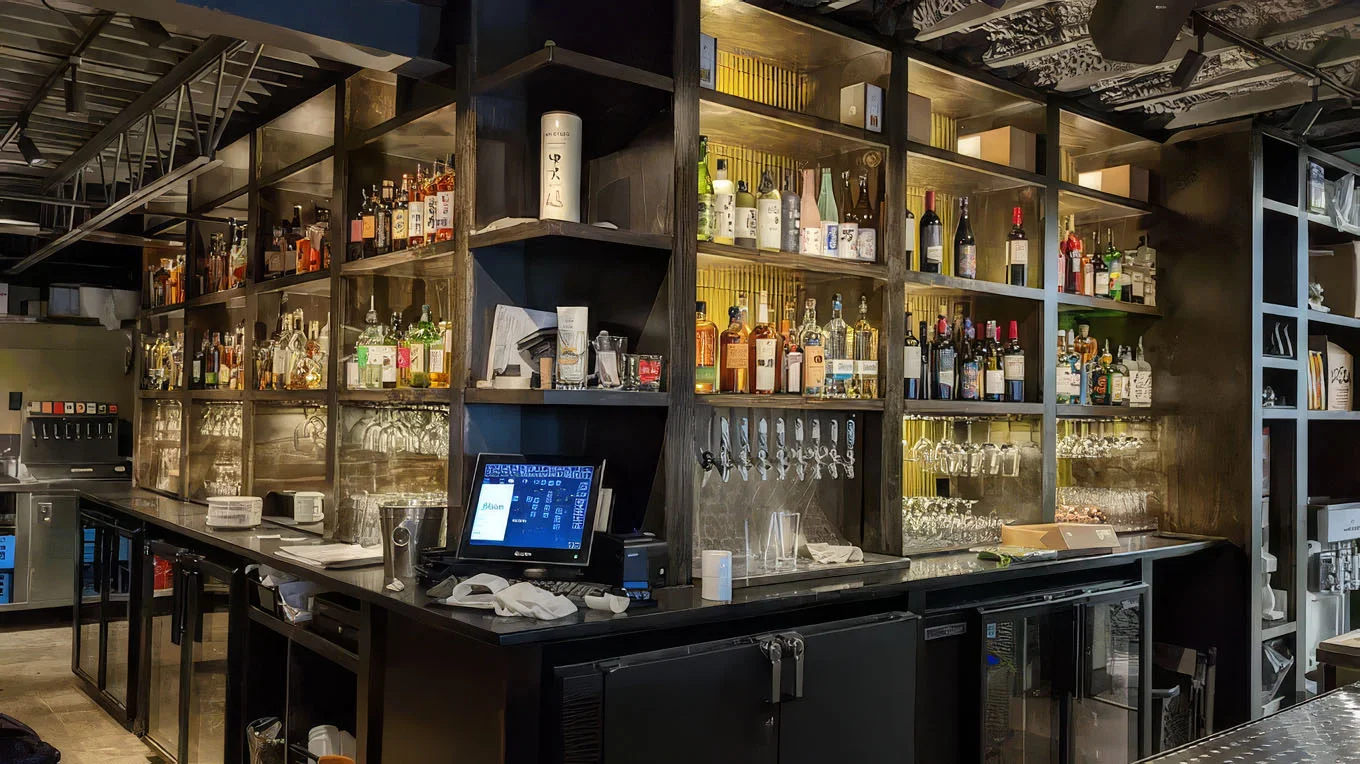 Modern bar interior with a variety of spirits and cocktails