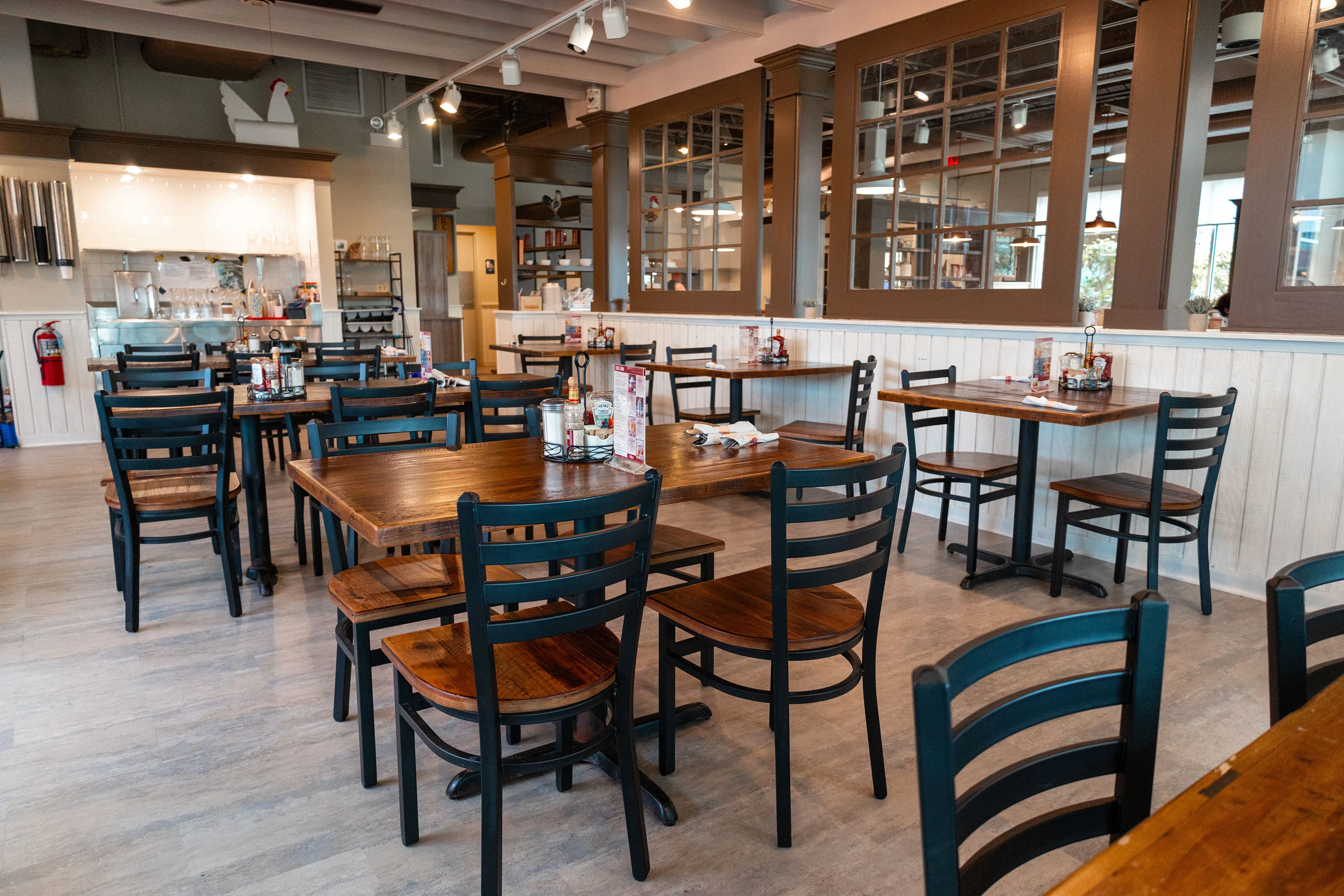 Cozy restaurant interior with wooden tables and chairs