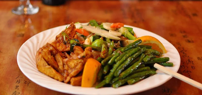 Chinese stir-fried chicken with vegetables and green beans