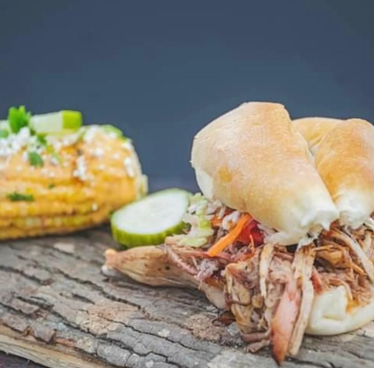Pulled pork sandwich with coleslaw and pickles