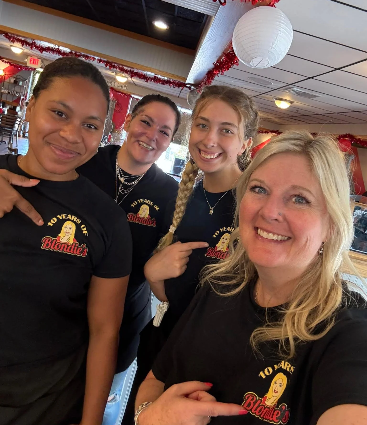 Staff celebrating 10 years at Blondie's restaurant