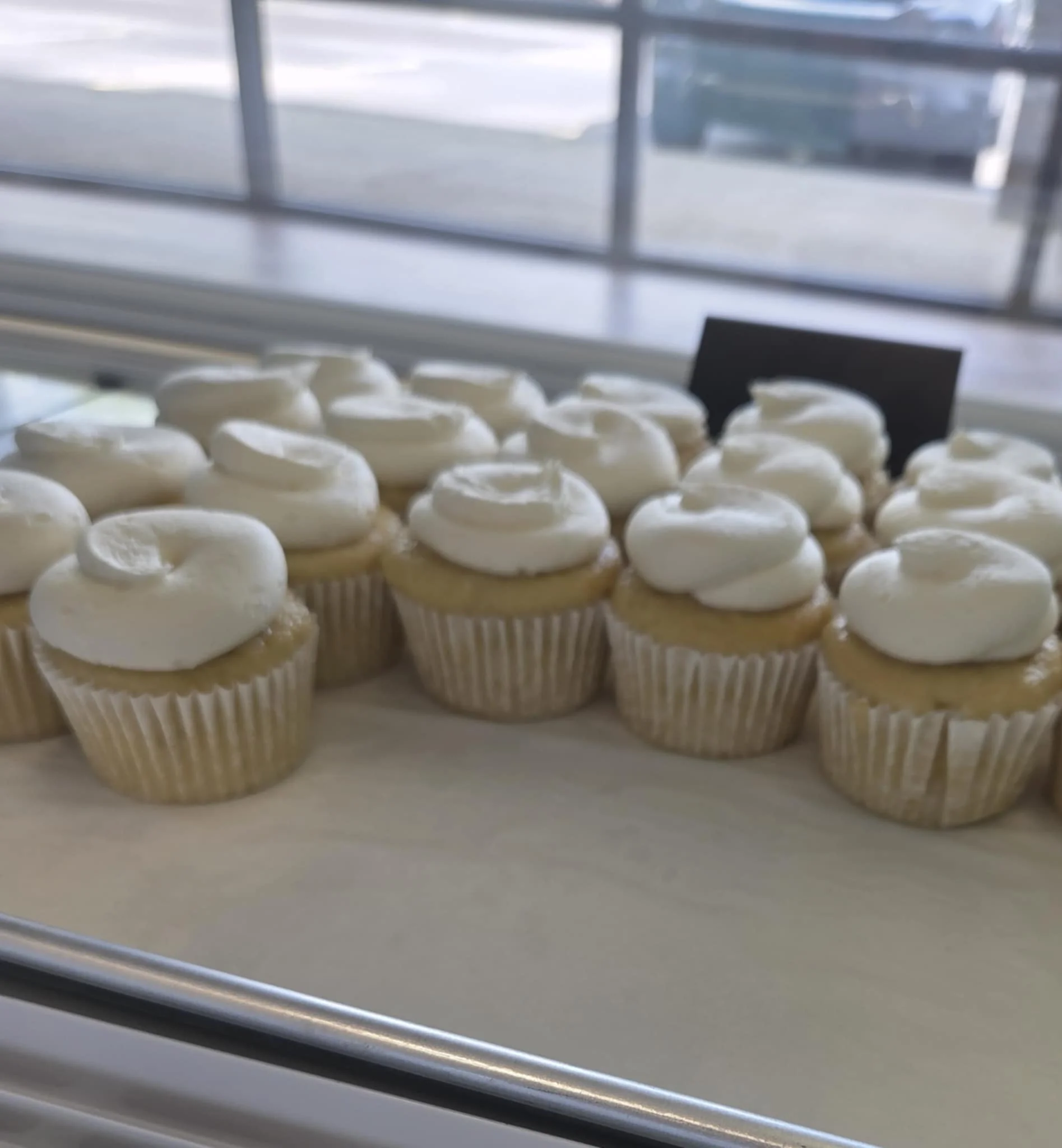 Delicious vanilla cupcakes with creamy frosting