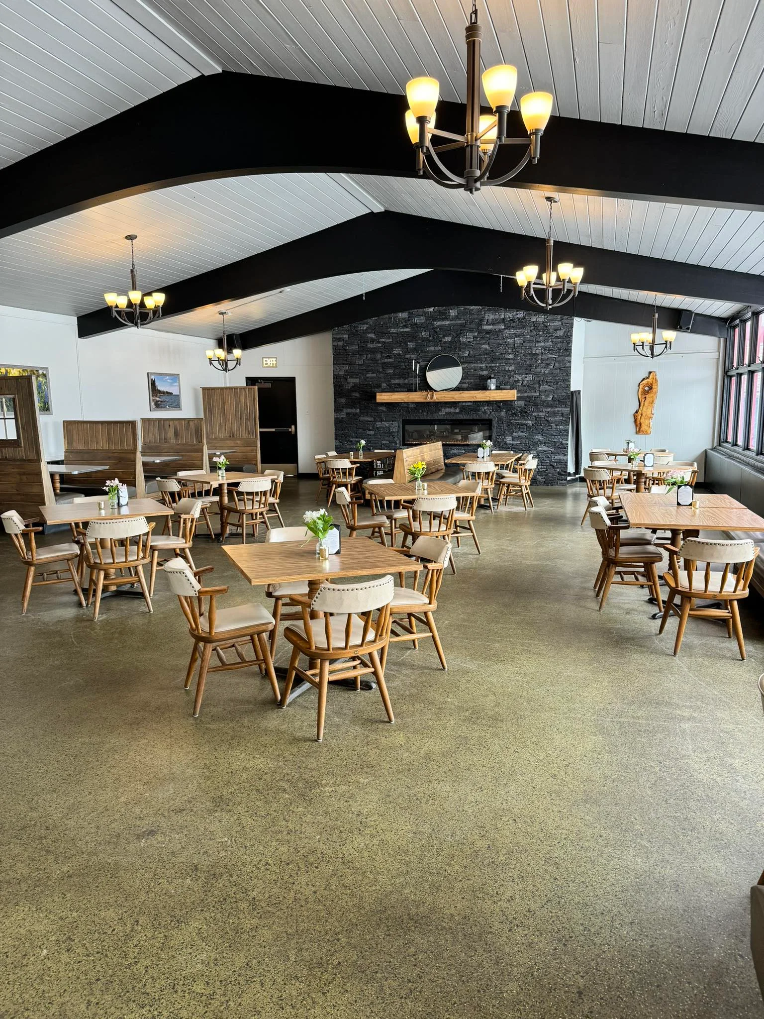 Cozy restaurant interior with wooden furniture and warm lighting