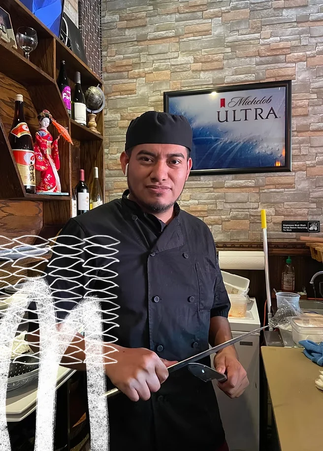 Chef preparing dishes in a vibrant restaurant kitchen
