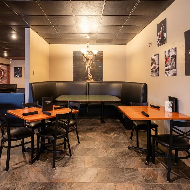 Delicious gourmet burger with fresh toppings on a wooden table