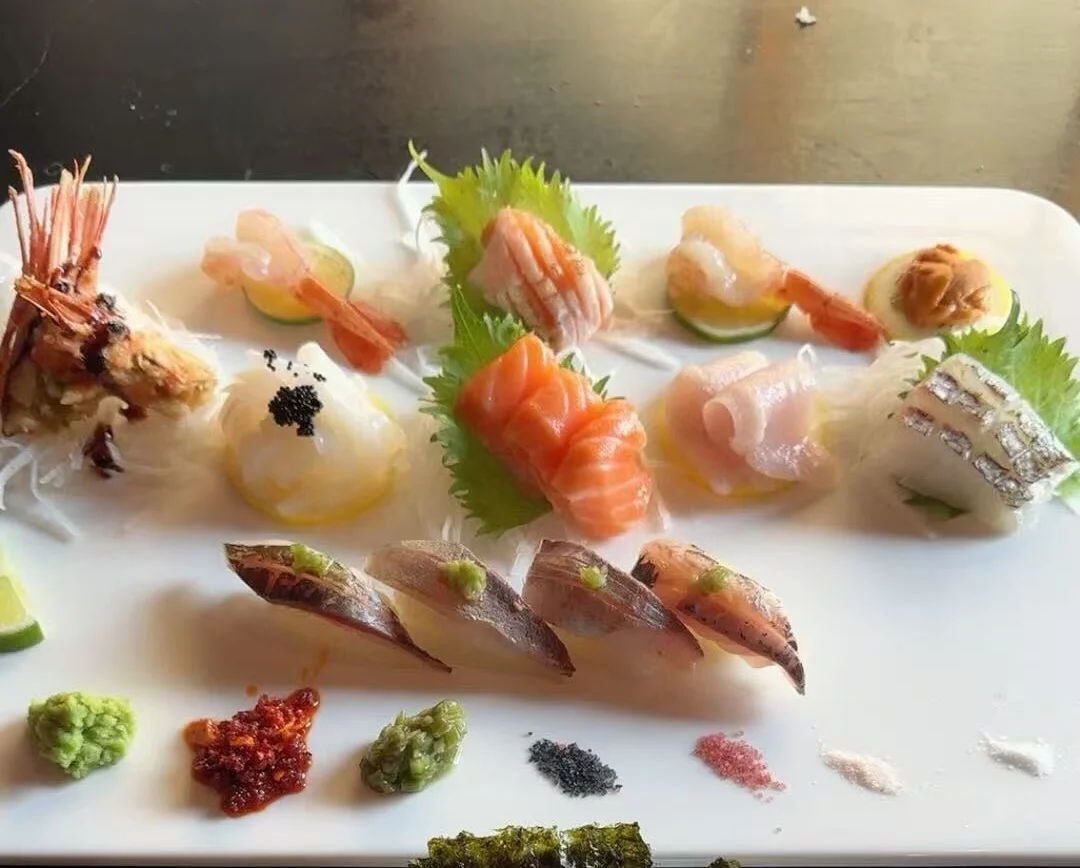 Assorted Japanese sushi platter with rice and egg yolk