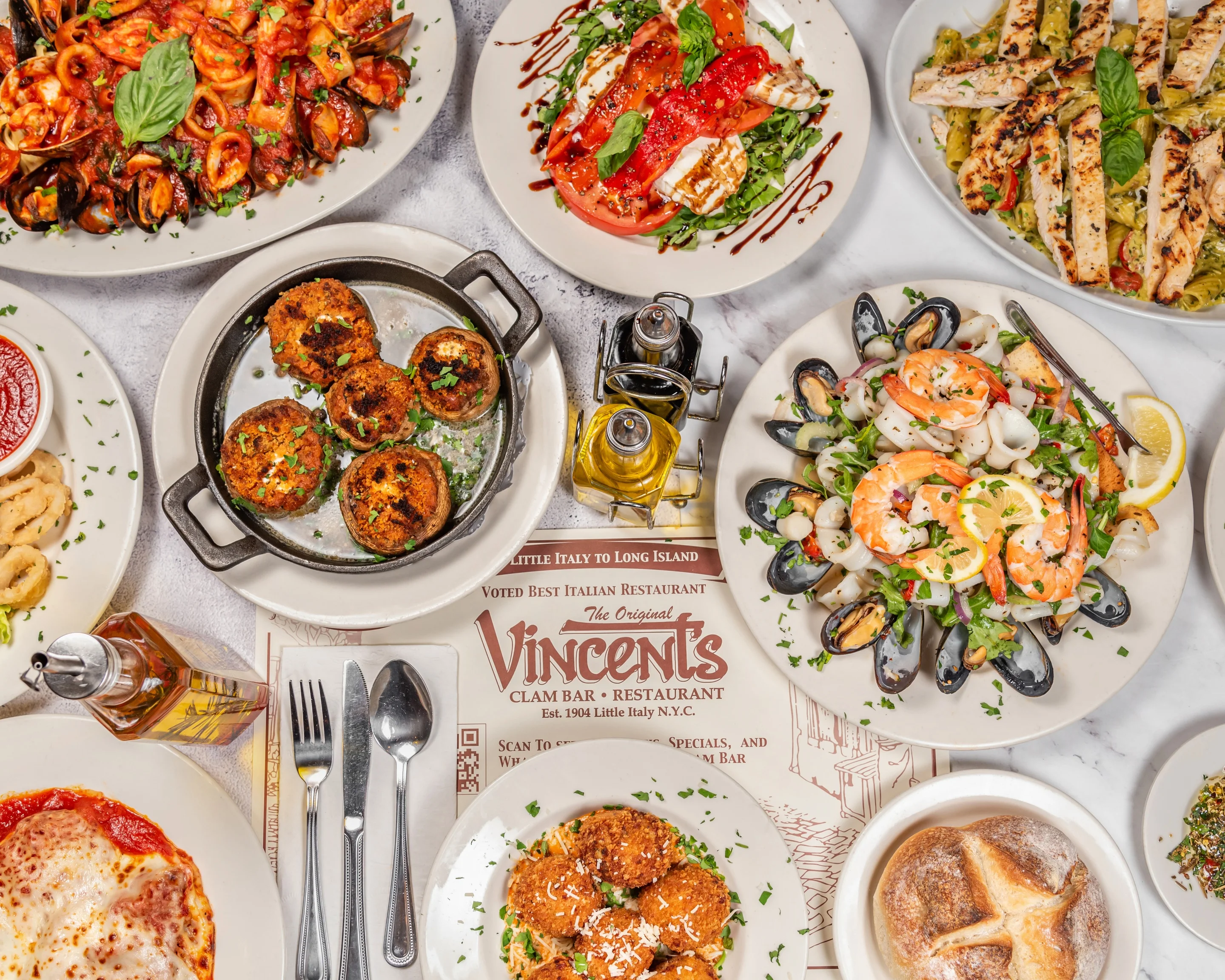 Italian seafood platter featuring shrimp, mussels, and calamari