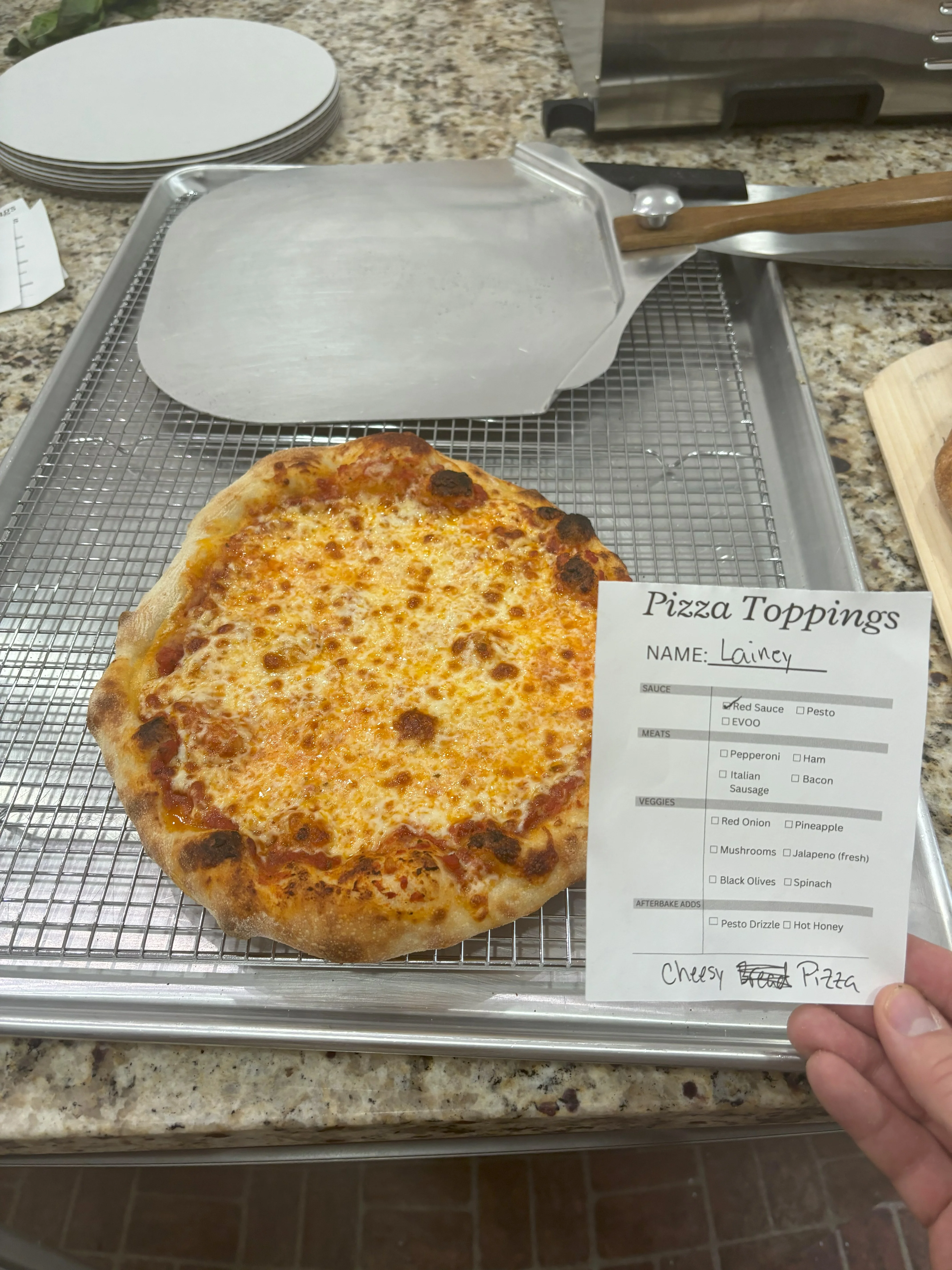 Cheesy pizza with a golden crust and fresh mozzarella