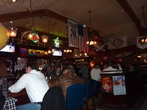 Guests enjoying the lively bar and welcoming hospitality at Mason Jar, a popular restaurant, bar, and live music venue in Mahwah, New Jersey.
