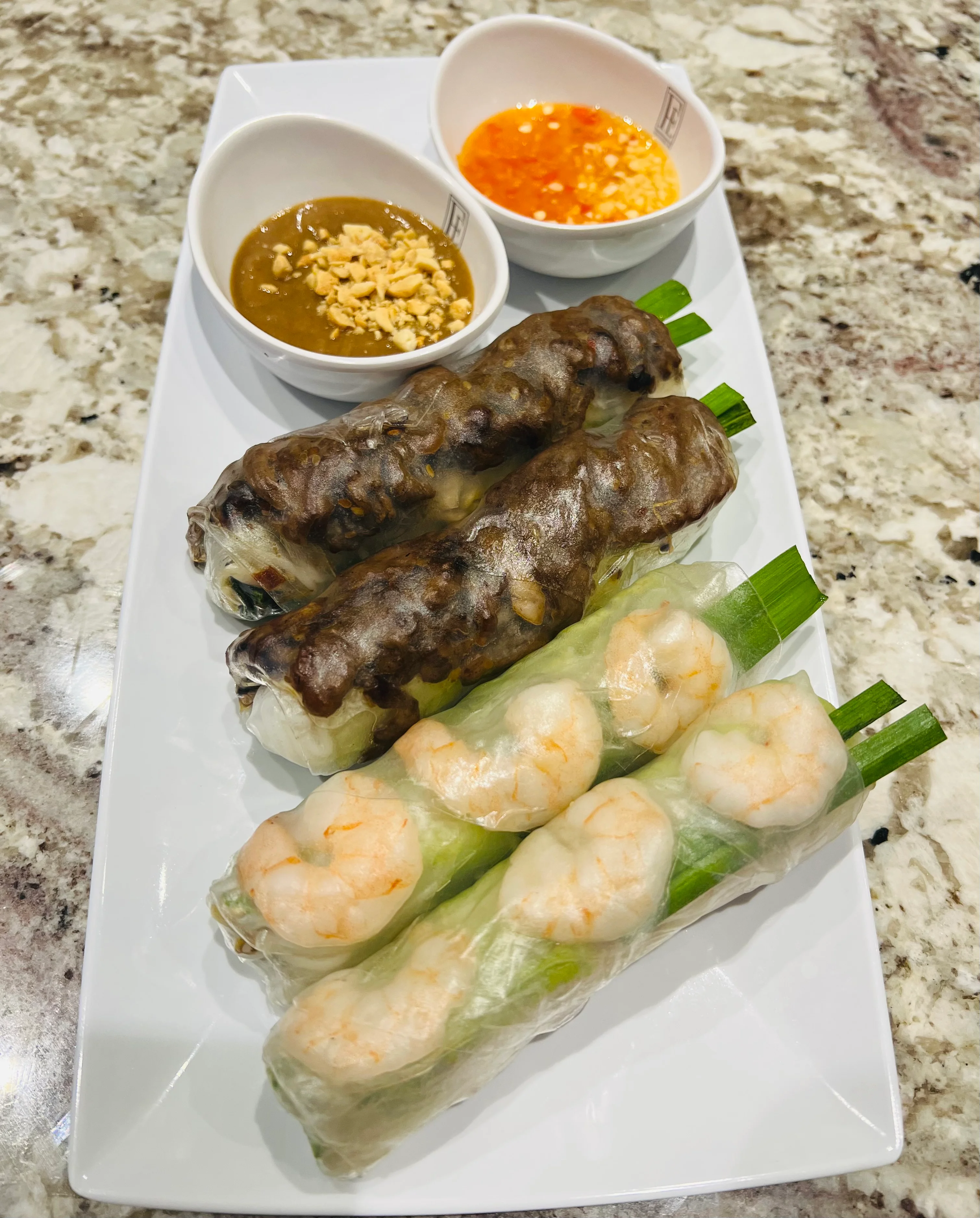 Vietnamese fresh spring rolls with shrimp and dipping sauces