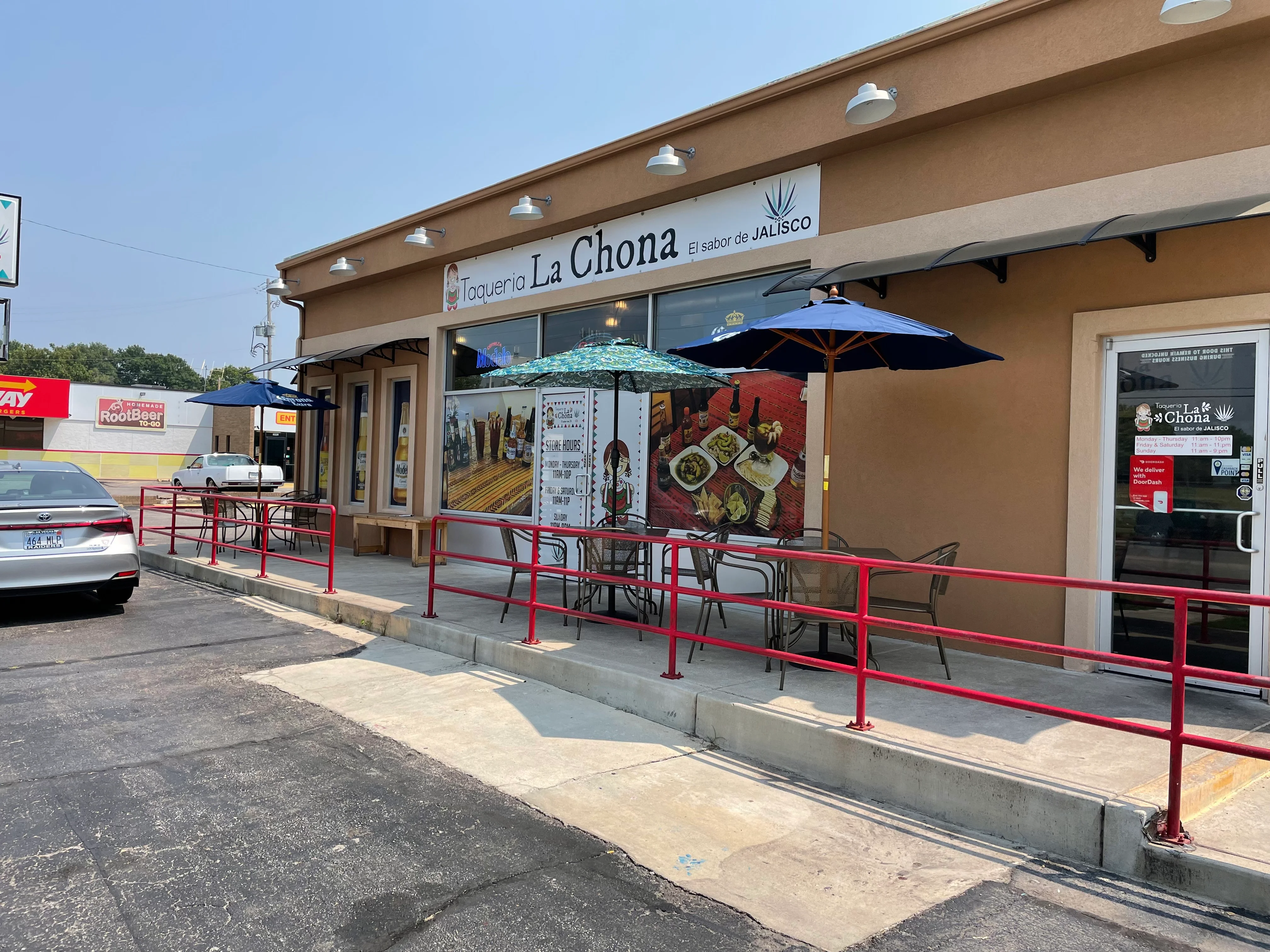 Exterior view of Taqueria La Chona with outdoor seating