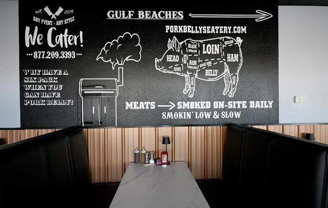 Cozy restaurant interior with chalkboard menu and seating
