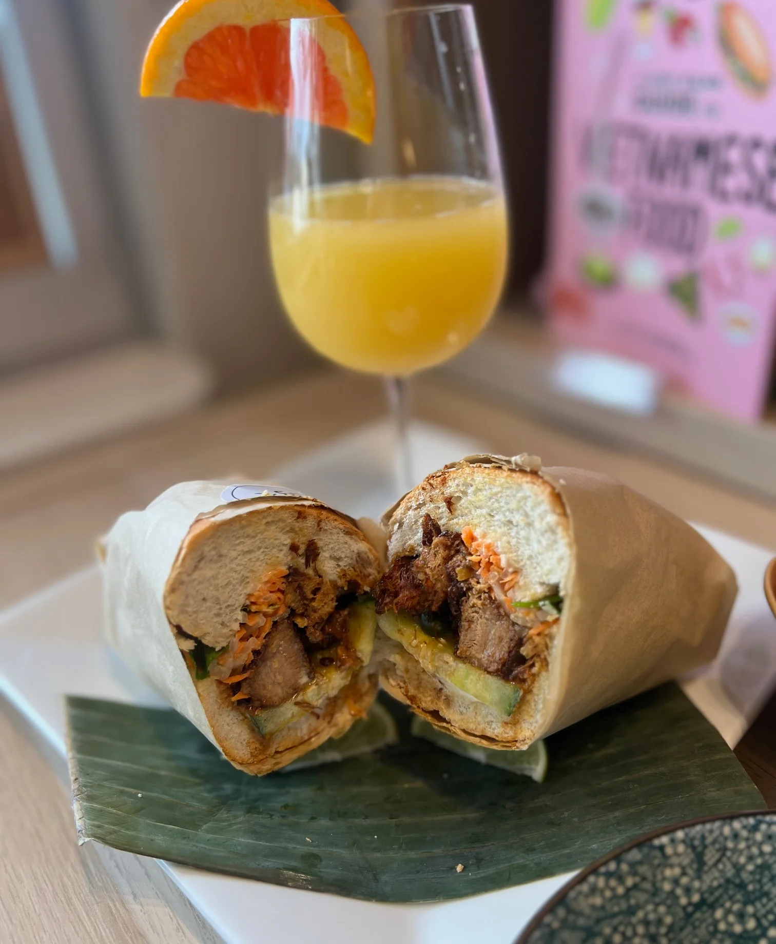 Vietnamese banh mi sandwich with crispy pork and fresh vegetables