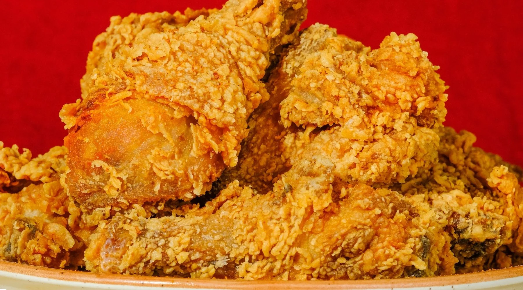 Crispy Southern fried chicken pieces piled high