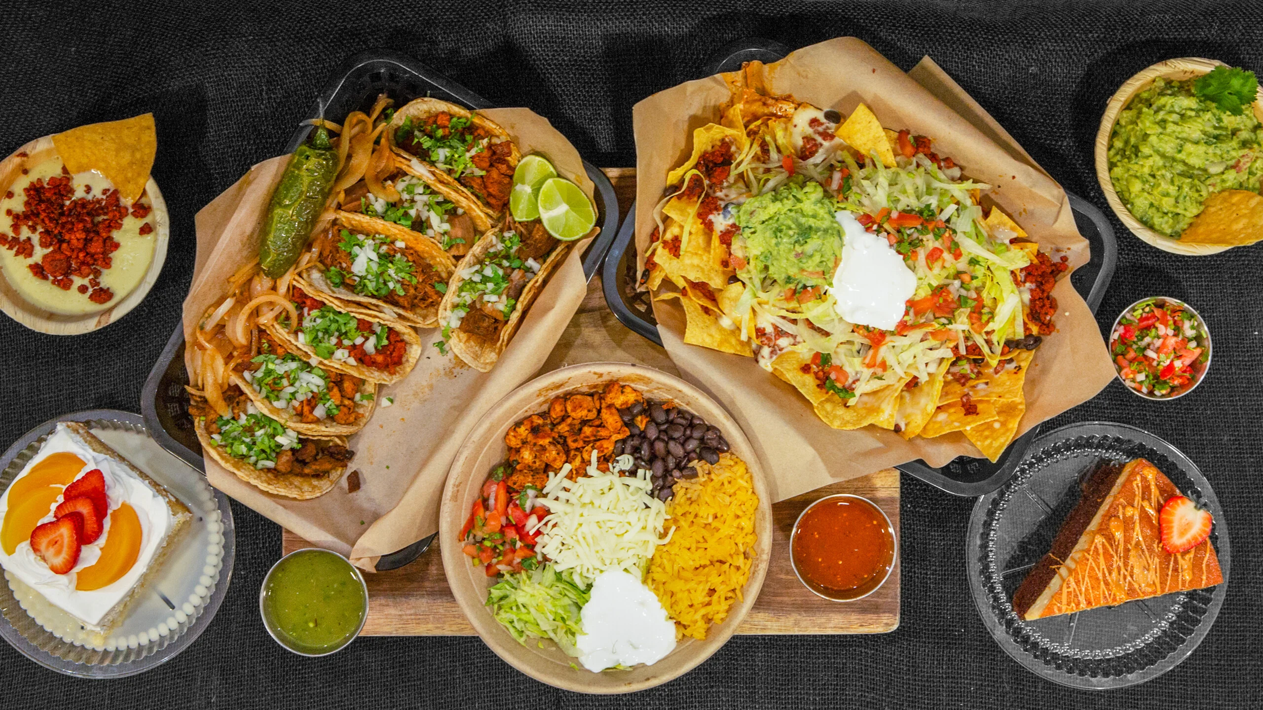 Vibrant Mexican taco platter with nachos and guacamole