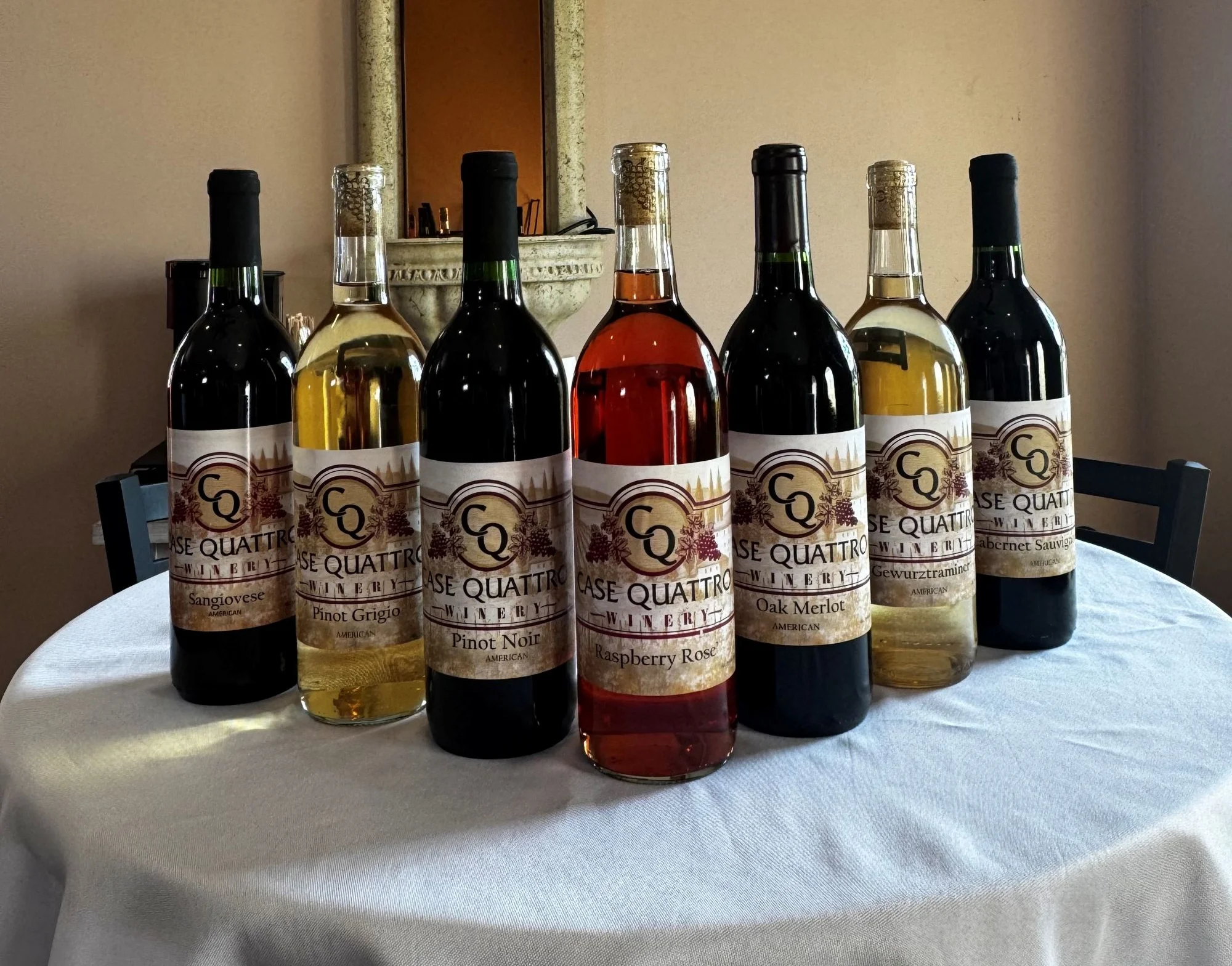Selection of wines from Case Quattro Winery on a table