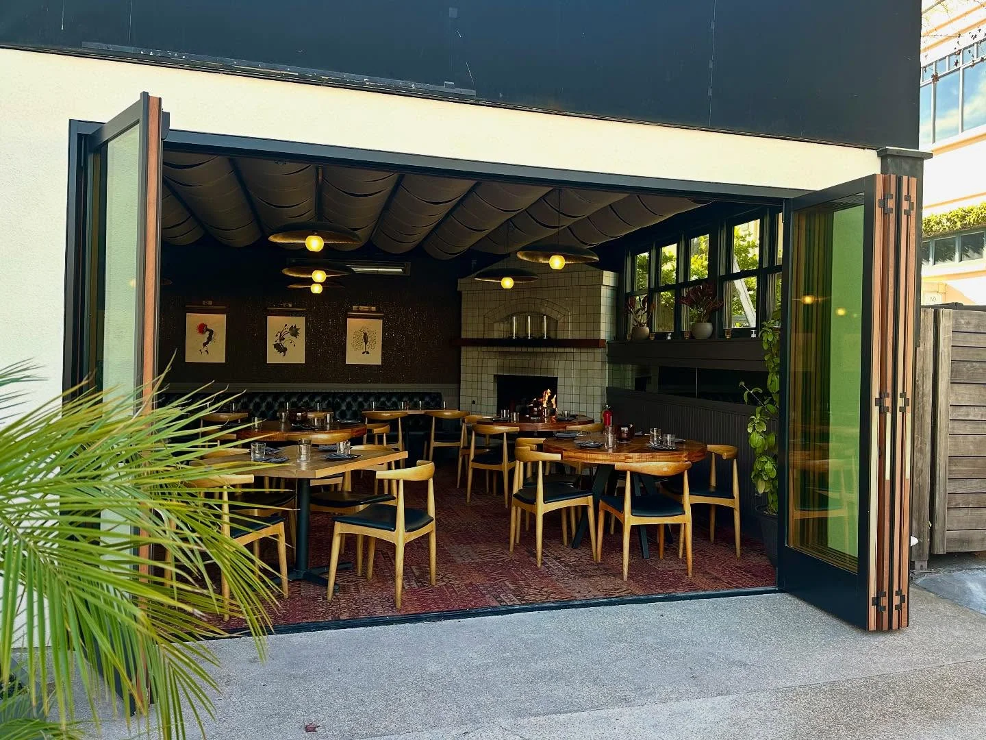 dining room with doors open to the outside area