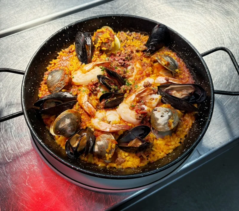 Traditional Spanish paella with seafood and saffron rice