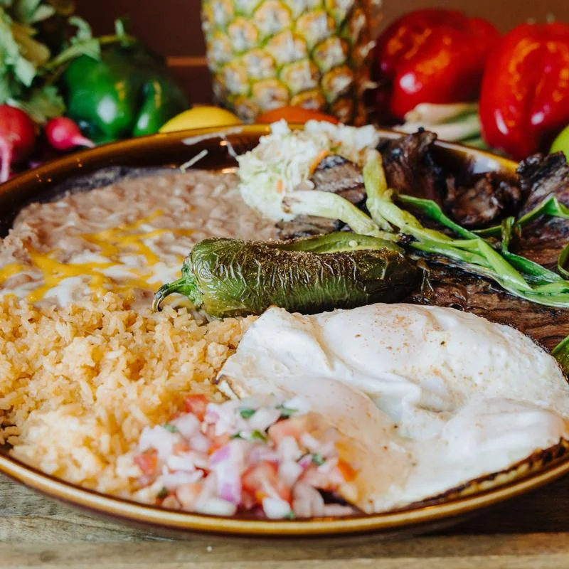 Traditional Mexican breakfast platter with eggs and beans