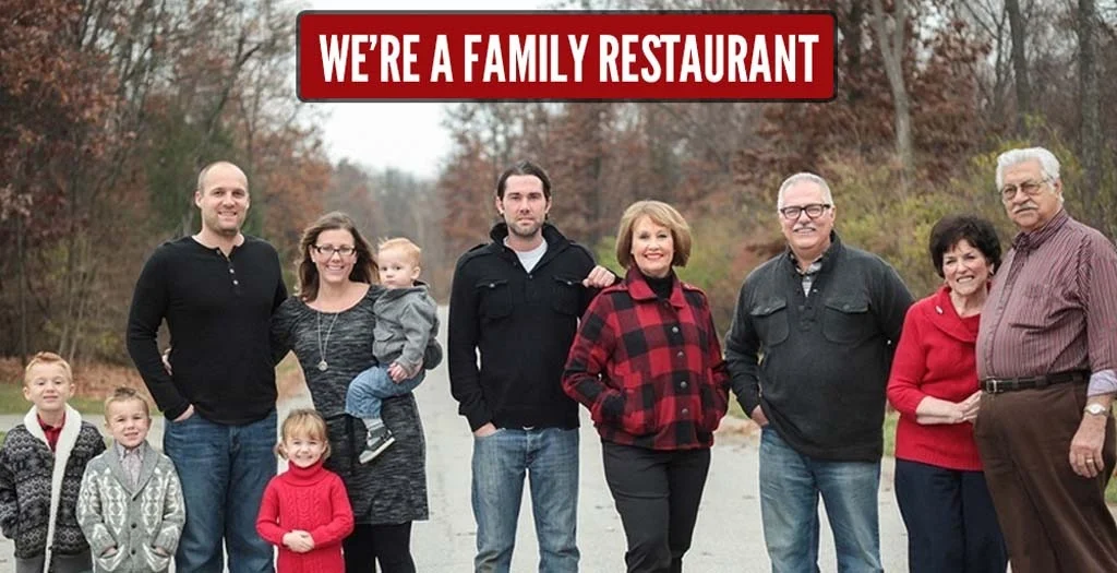 Delicious family-style meal served on a wooden table.