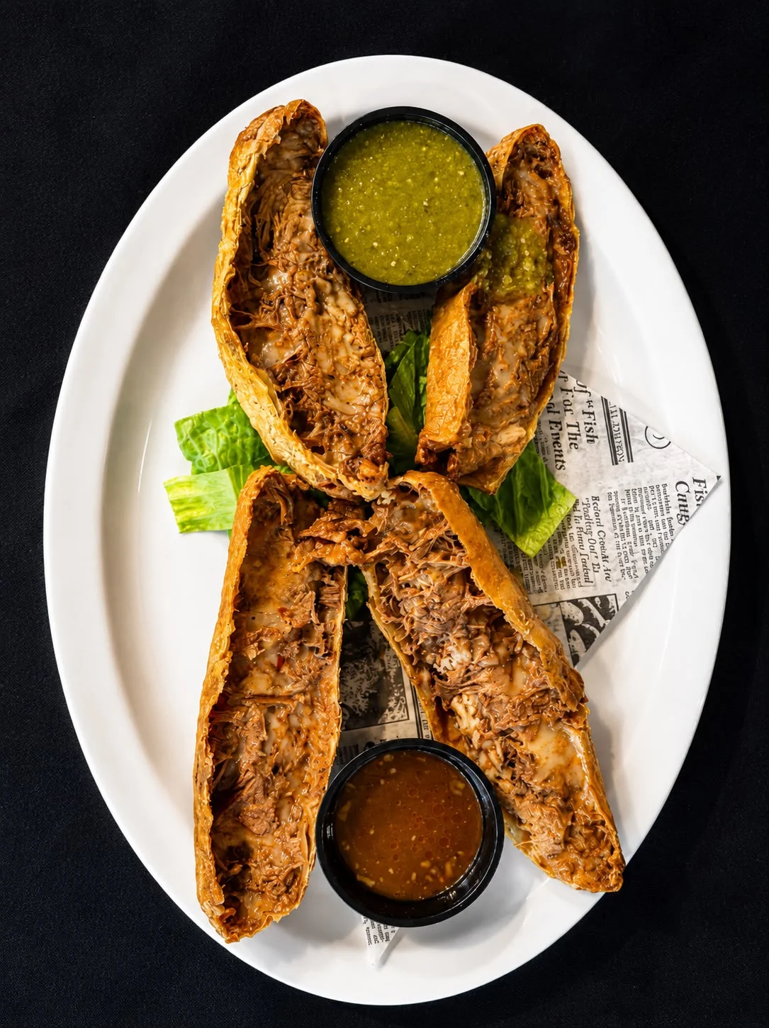 Crispy Mexican tacos filled with shredded beef