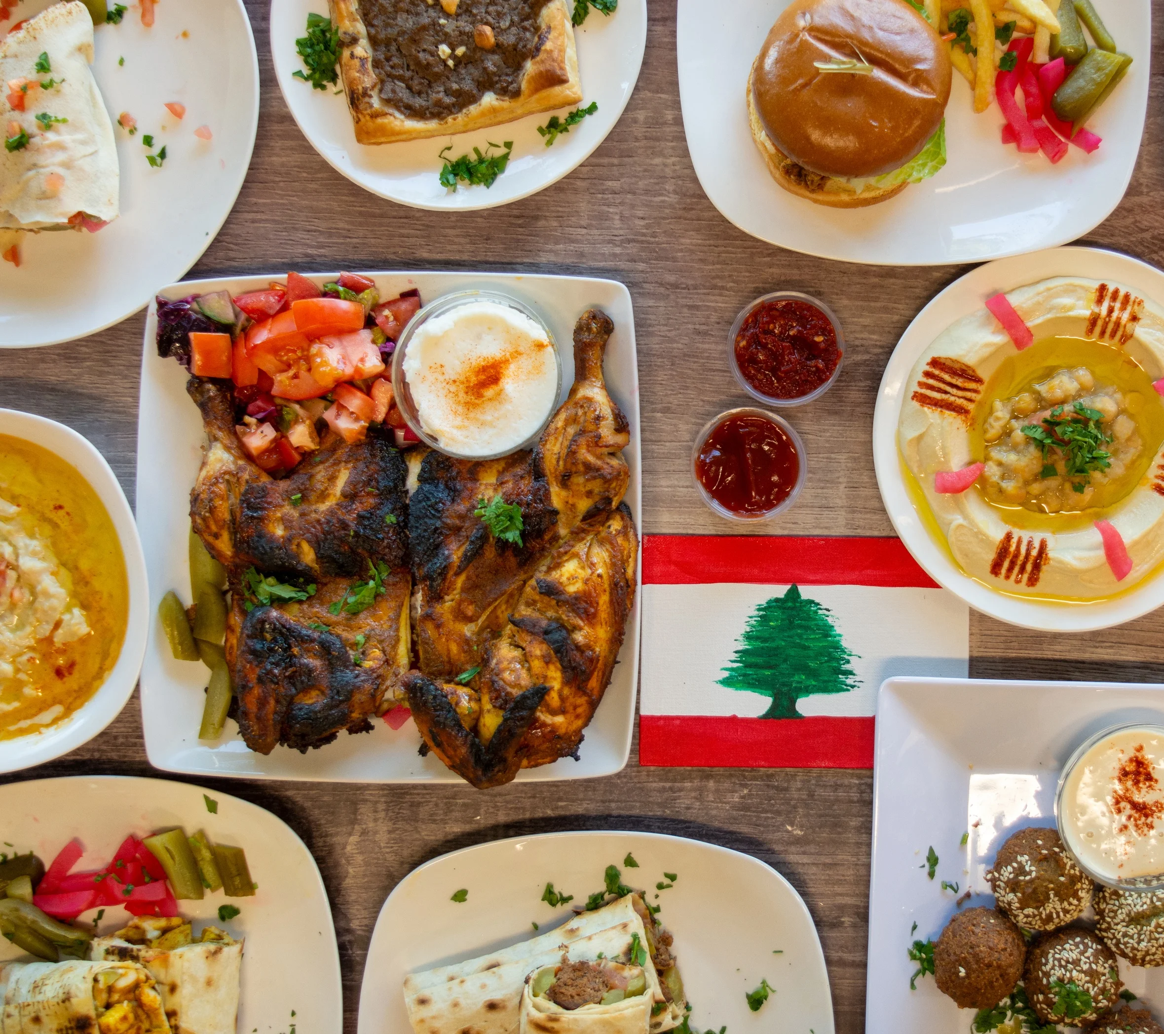 Lebanese mezze platter with grilled chicken and hummus