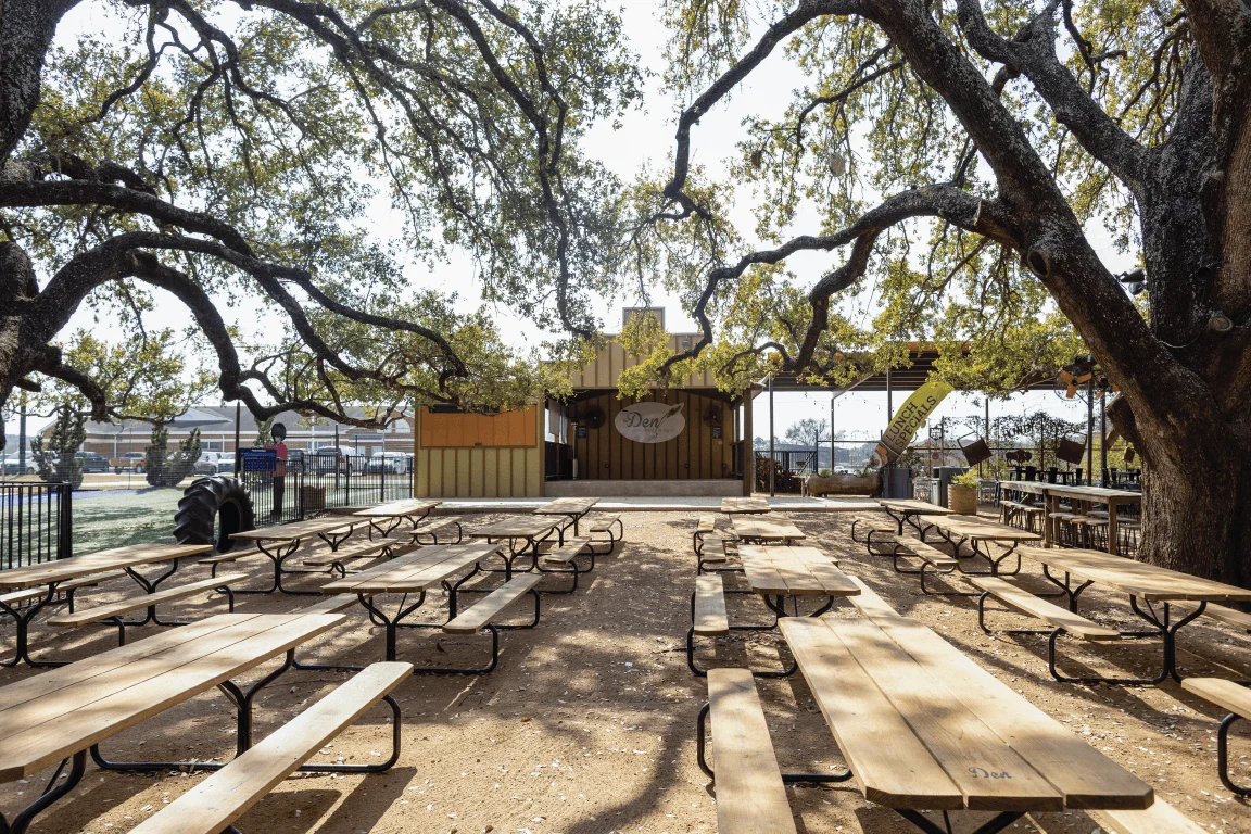 Delicious gourmet burger with fresh toppings on a wooden table