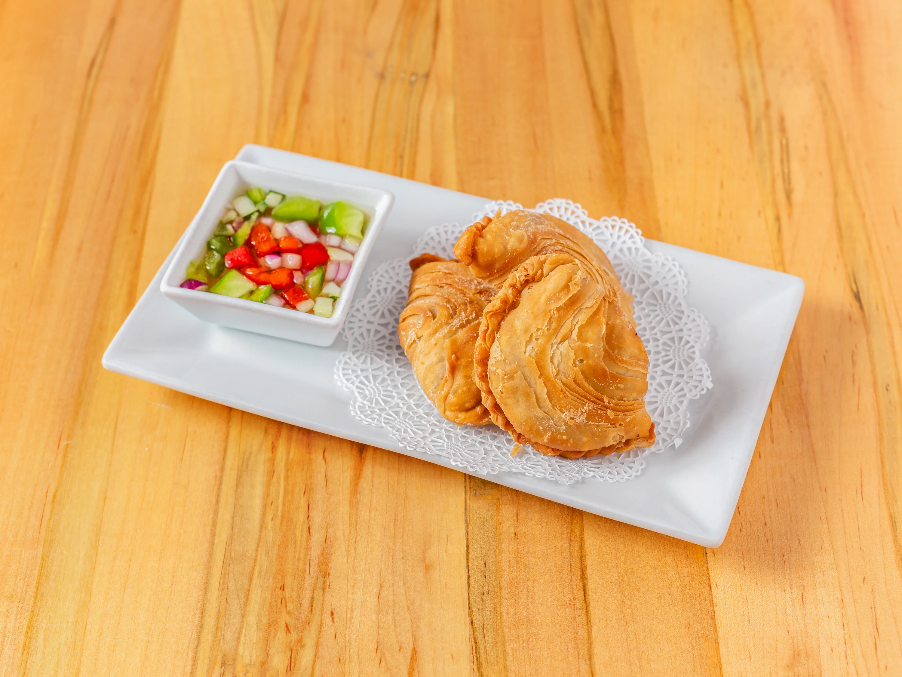 Crispy Malaysian curry puff with dipping sauce