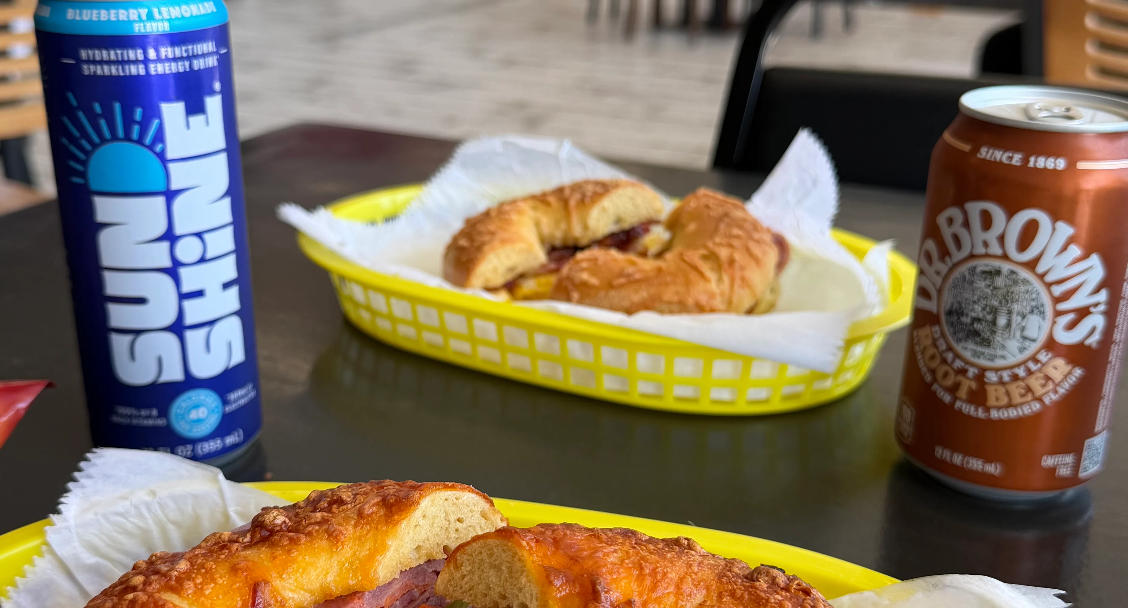 A colorful bagel tray featuring assorted bagels and toppings.