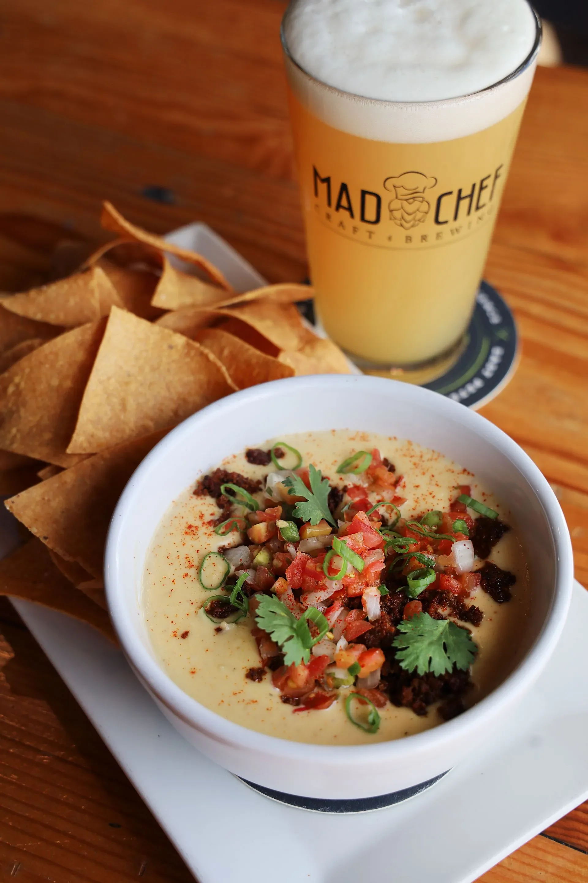 Creamy queso dip with tortilla chips