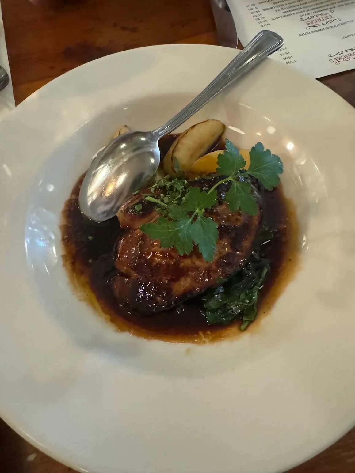 Savory Asian-style glazed chicken with greens and garnish
