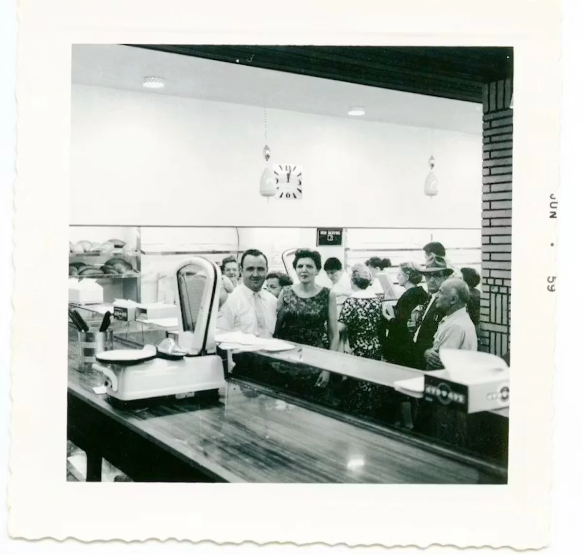 Vintage restaurant interior with patrons and staff