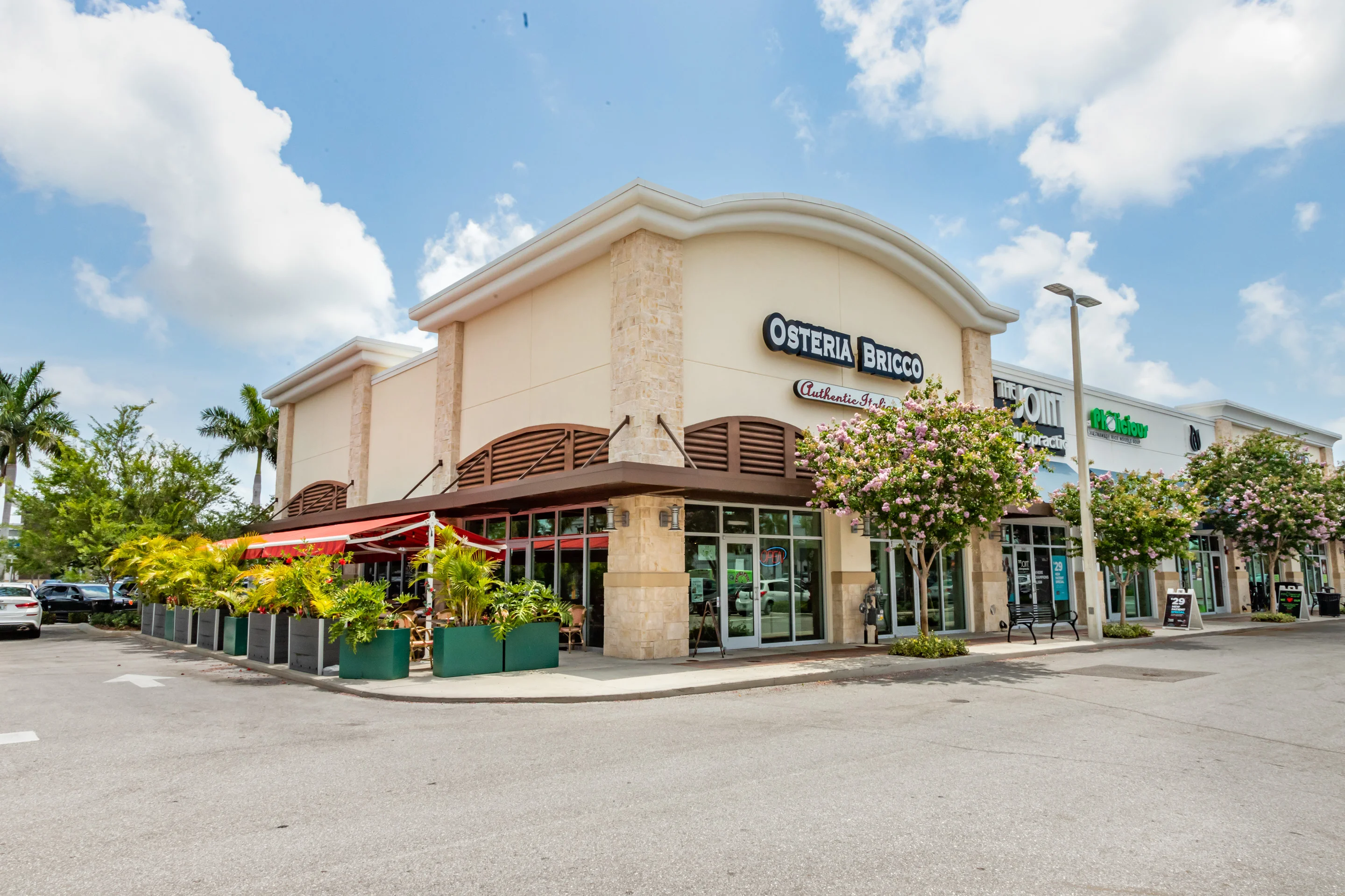 Exterior view of Osteria Bricco, an Italian restaurant with outdoor seating