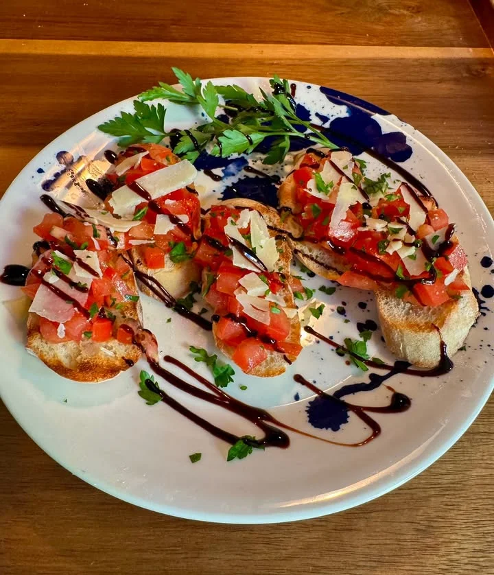 Bruschetta with fresh tomatoes and balsamic drizzle