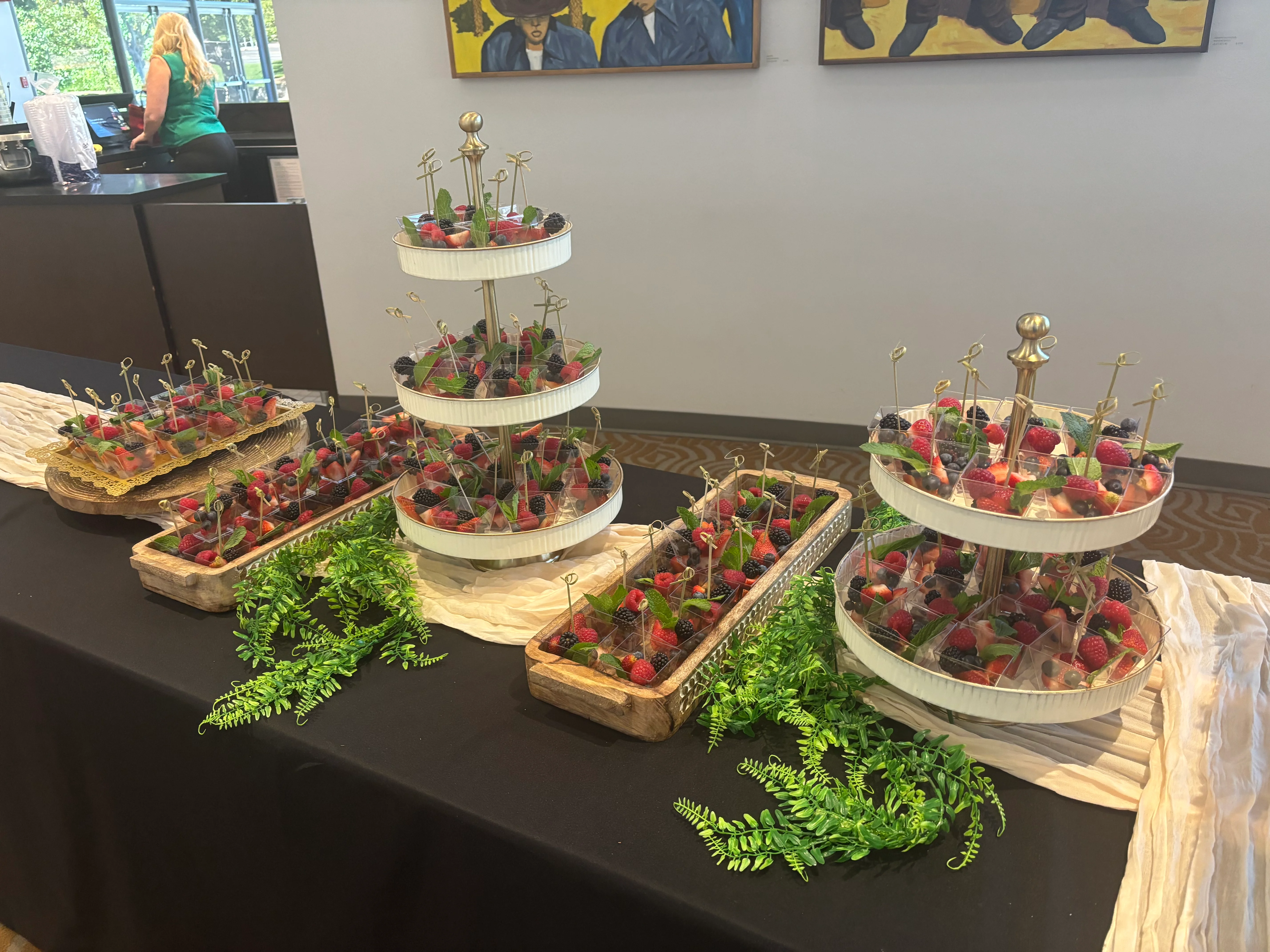 Elegant fruit display with assorted berries on tiered stands