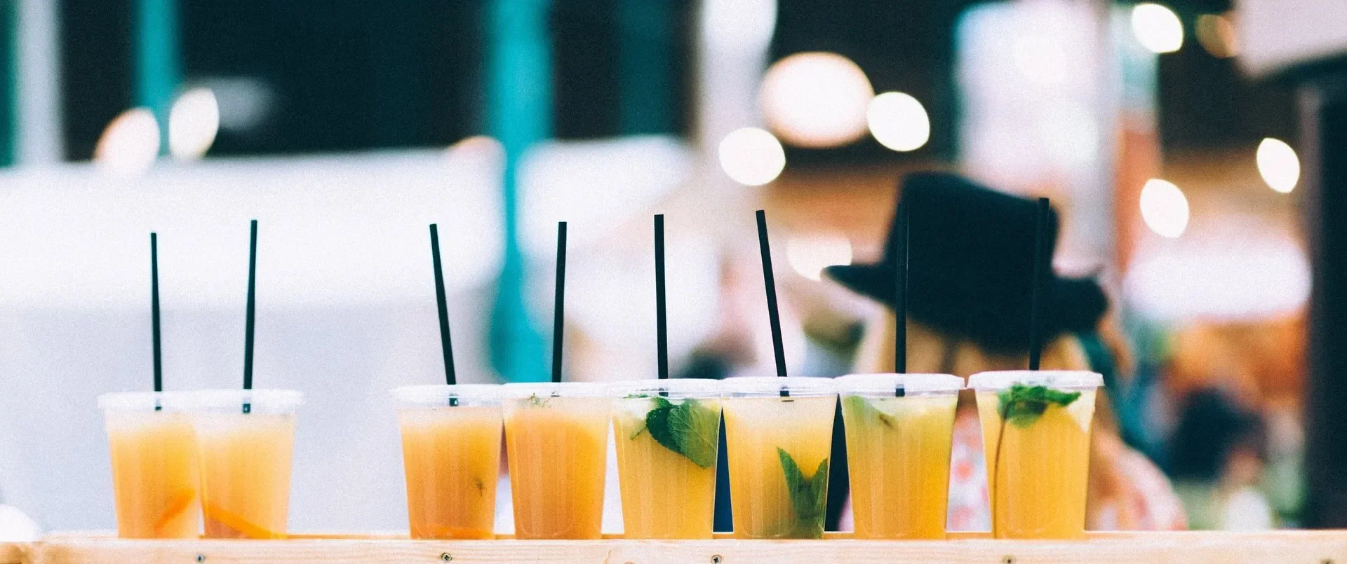 Refreshing fruit-infused beverages in clear cups