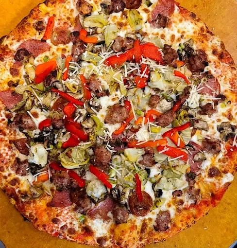 Loaded Italian sausage pizza with assorted toppings