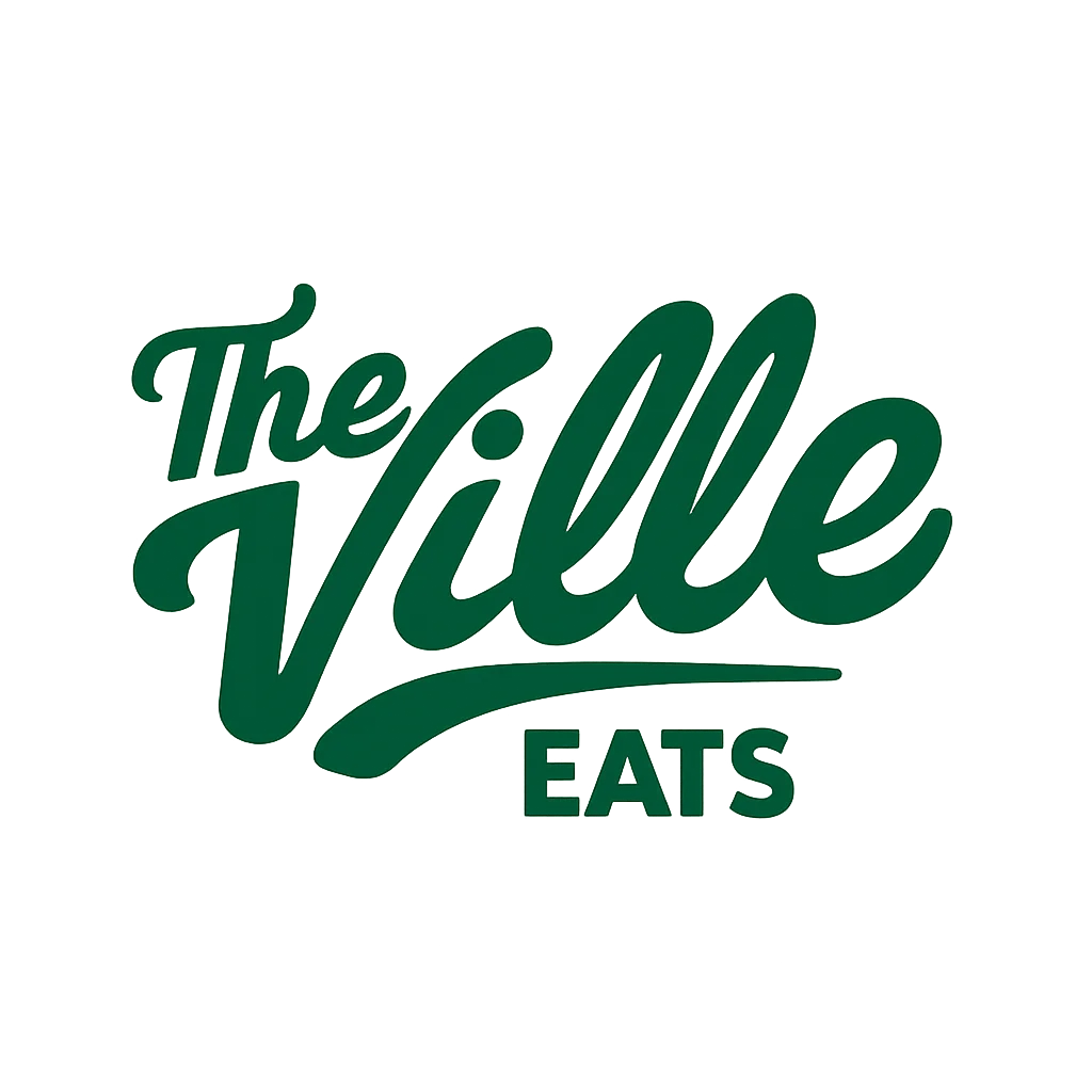 Logo of The Ville Eats restaurant on a green background